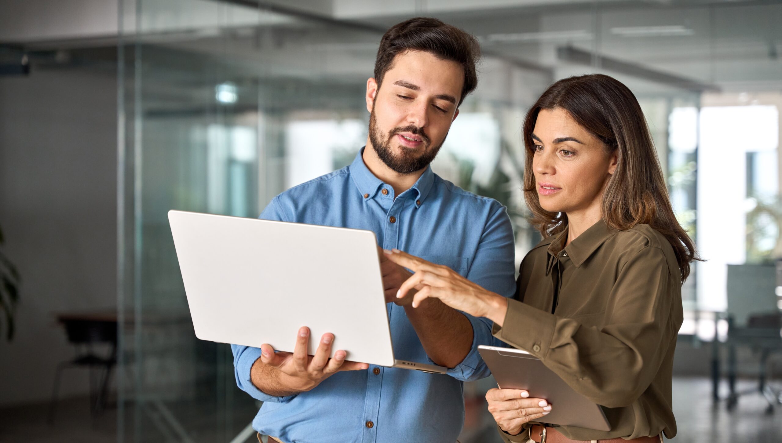 Two,Busy,Professional,Business,People,Working,In,Office,With,Computer.