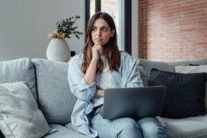 woman thinking of sales internship